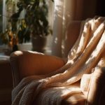 cozy-armchair-draped-with-a-warm-blanket-in-a-sunlit-room-surrounded-by-plants-photo